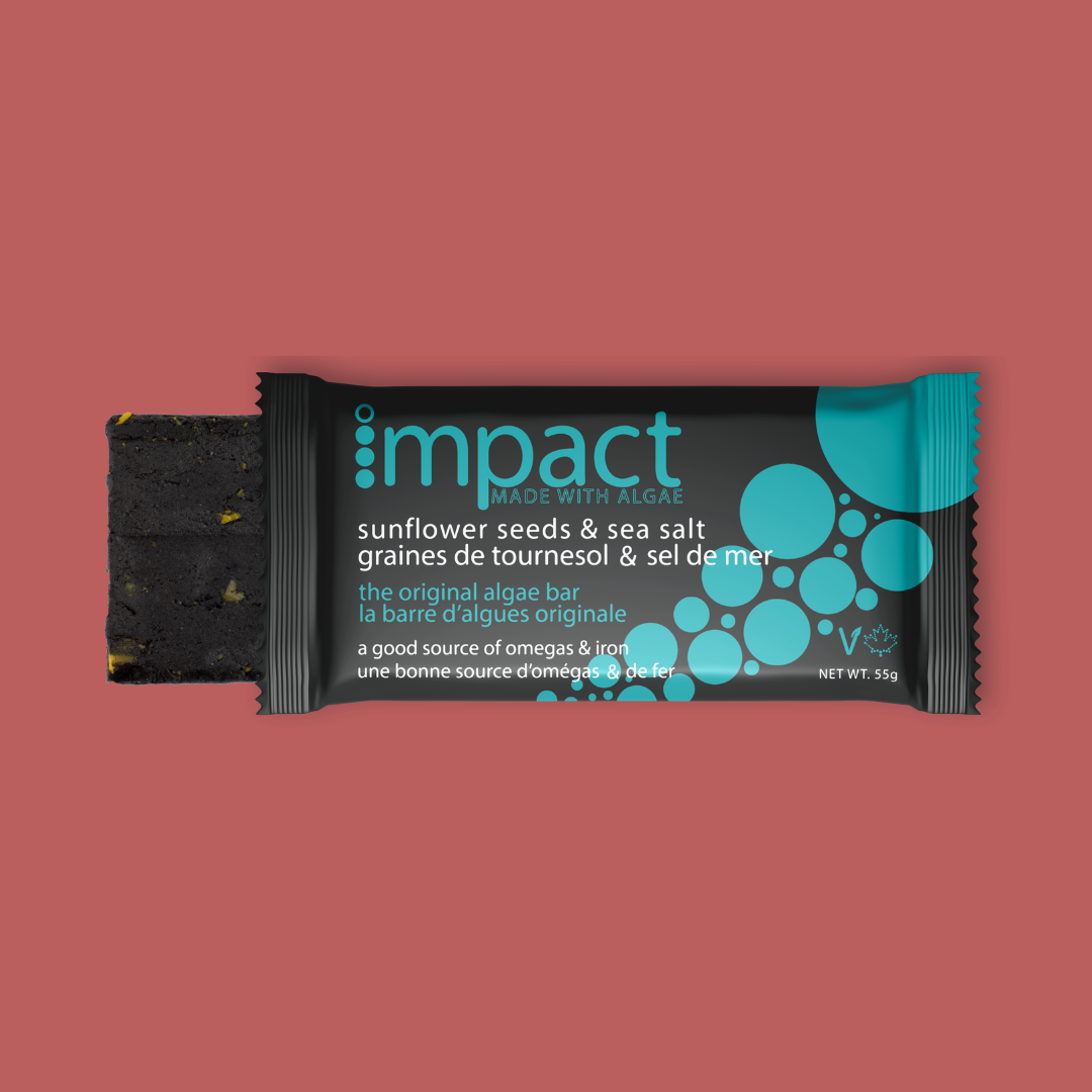 Sunflower Seed & Sea Salt IMPACT Bar coming out the packaging, packaging showing the front panel of the wrapper